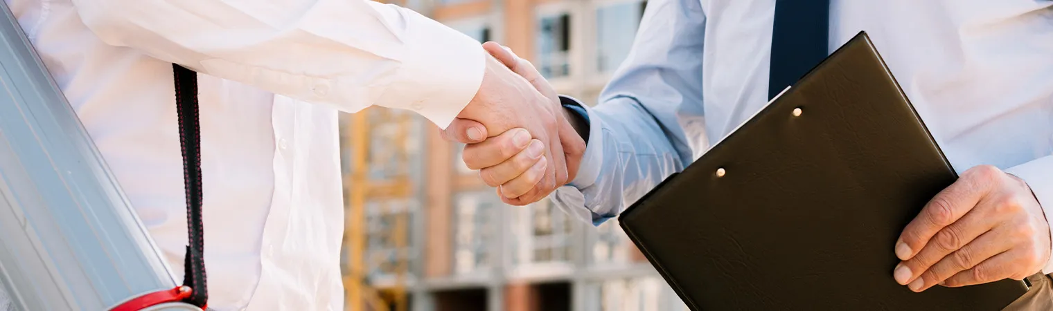 Business meeting with people discussing property map on a wall